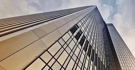 A tall building against a clear sky backdrop